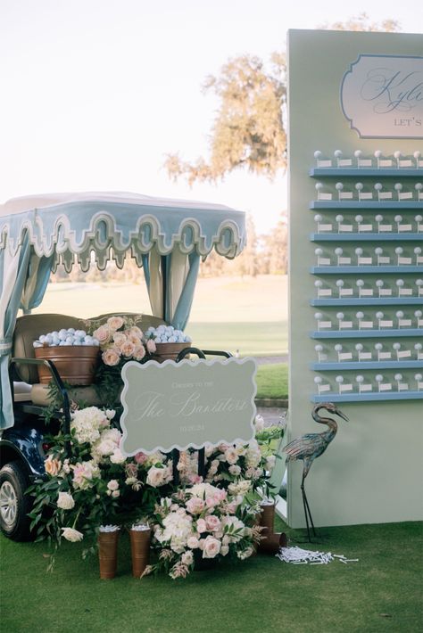 Custom Green and Blue Golf Theme Escort Card Wall with Herrons and decorated Golf Cart at Frederica Golf Club on Saint Simons Island, Georgia!   Designed and Planned by Maren White with TOAST Events Photography by Eric Kelley Golf Gala Decor, Golf Course Tent Wedding, Golf Wedding Guest Book Ideas, Golf Theme Photo Backdrop, Golf Wedding Centerpieces, Golf Themed Seating Chart, Golf Wedding Seating Chart, Golf Theme Decor, Golf Rehearsal Dinner Ideas