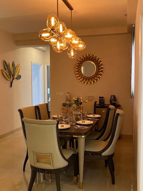 Customized and Stylish Interior Décor for a Sample Flat in Gurugram | homify Indian Dining Room Decor, Fall Dining Room Table, Designer Beds, Perimeter Lighting, Dining Table Design Modern, Stylish Dining Room, India Home Decor, Indian Home Interior, Statement Chandeliers