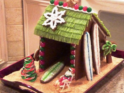 - My husband is an avid surfer, so he gets his own palapa every Christmas! Hawaii Gingerbread House, Tiki Gingerbread House, Hawaiian Gingerbread House, Tropical Gingerbread House Ideas, Tropical Gingerbread House, Gingerbread House Ideas Funny, Beach Gingerbread House, Funny Gingerbread House Ideas, Decorated Cookies Christmas