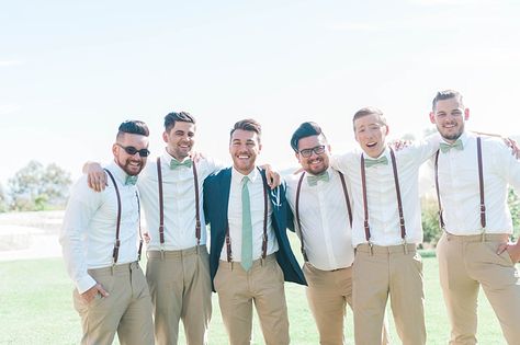 Groom Navy Jacket Beige Pants Light Green Tie Groomsmen White Shirt Green Bowtie Leather Suspenders Beige Pants Soft Blush Sage Green Wedding California http://julia-rosephotography.com/ Khaki And Sage Groomsmen, Tan And Sage Green Groomsmen Attire, Sage Green Groomsmen Attire Suspenders, Sage Green Suspenders Wedding, Sage Green Bow Tie Groomsmen, Sage Green Suspenders, Sage Green Bow Tie And Suspenders, Green Bowtie, Brown Suspenders