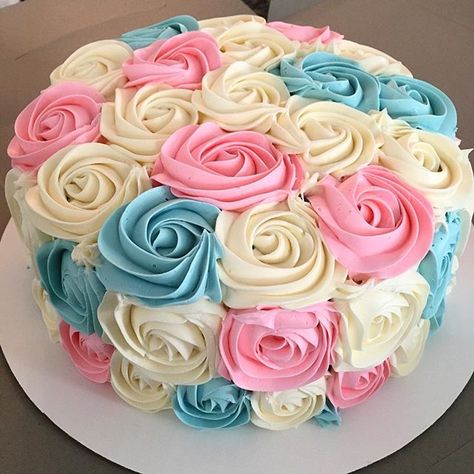 Sold my first cake today! So exciting and soooo nerve-racking at the same time, but I loved it! #baking #rosettecake #genderrevealcake Pink And Blue Rosette Cake, Gender Reveal Cake Decoration, Blue Ombre Cake, Chewy Chocolate Chip Cookie Bars, Food Coloring Mixing Chart, Rosette Cakes, Gender Reveal Food, Slow Cooker Potato, Baby Reveal Cakes