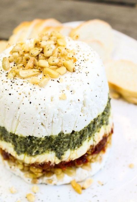 Goat Cheese, Pesto, and Sun-Dried Tomato Terrine | TheFoodCharlatan.com Cheese Terrine, Goat Cheese Pesto, Christmas Flavors, Stomach Rumbling, Pesto Cheese, The Food Charlatan, Food Charlatan, Christmas Foods, Cheese Party