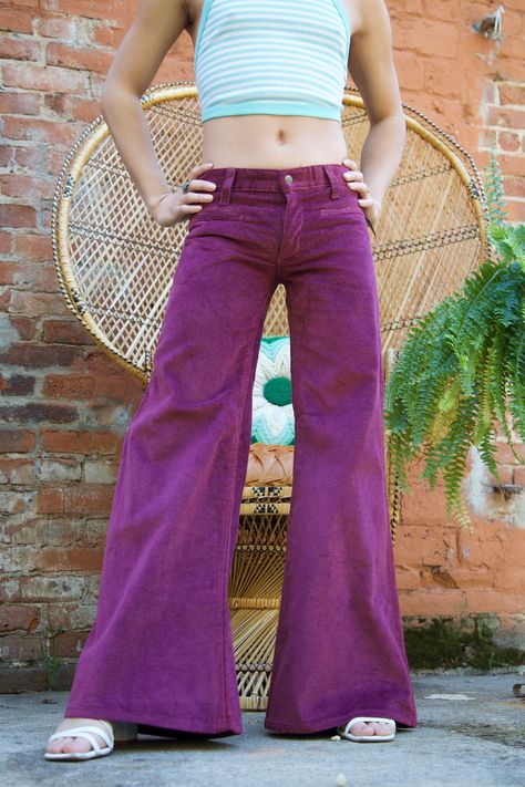 1970's Landlubber ultra low rise elephant bell bottoms  These are Deadstock with tags but do have some fading around the waist as seen in picture  Waist - 29in at 8in rise  hips - 18in across  inseam - 30in To ensure the proper fit please make sure that you measure your waist at the correct rise! if it says 12 in rise measure 12 in up from your crotch and then measure your waist there. The pants from the past do not have elastic like the pants now a days so if you are measuring a 26 you want to 70s Outfits 1970s, Purple Flare Pants, Purple Flare Jeans, Purple Flared Pants, Purple Bell Bottom, 1970s Fitted Full-length Pants, 70s Outfits, Seventies Fashion, Gyaru Fashion