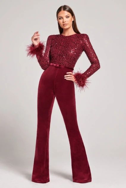 The perfect christmas or new year's jumpsuit from nadine merabi, in soft velvet, sequin and trimmed with ostrich maribou feathers on the cuffs. comes with a belt and has shoulder pads built in for a sharp shoulder and flattering figure. Superhero Outfits, One Piece Gown, Nadine Merabi, Feather Cuff, Embellished Jumpsuit, Evening Jumpsuit, Formal Tops, Velvet Flares, Jumpsuit Party