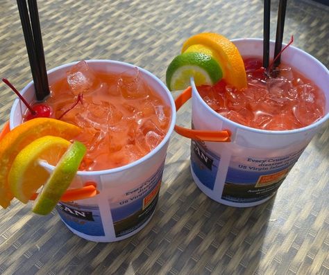 Home Recipe: Make Your Own Voodoo Bucket - Compass Cove Resort Voodoo Bucket Drink, Worm Bucket Drink Recipe, Voodoo Juice Cocktails, Rum Bucket Drinks, Rum Bucket Recipe Tipsy Bartender, Drink Bucket Recipes, Rum Buckets Recipe, Summer Bucket Drinks, Bucket Alcohol Drinks