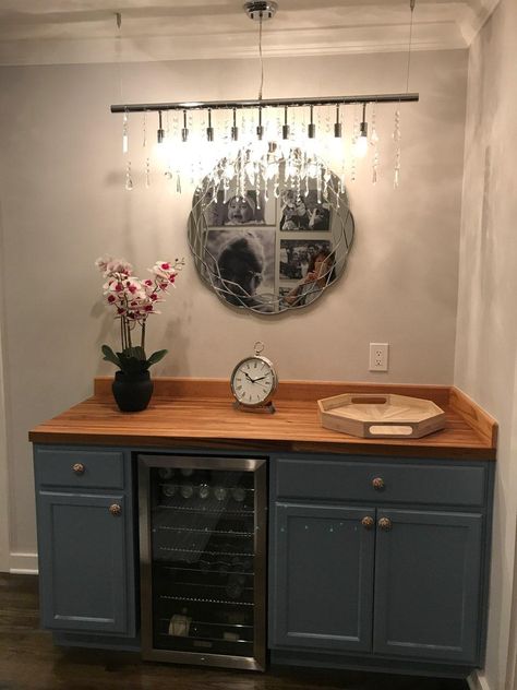 Easy to make dry bar using 2 ready-made cabinets (I bought mine at Home Depot). We added a butcher block top and a beverage refrigerator. The mirror and pendant lighting we got from Wayfair and adds just the right about of sparkle! Dry Bar With Butcher Block Top, Butcher Block Dry Bar, Butcher Block Bar Top, Butcher Block Bar, Diy Dry Bar, Wine And Coffee Bar, Coffee Stations, Beverage Bar, Butcher Block Top