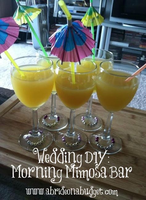 Start celebrating wedding morning with this DIY Wedding Morning Mimosa Bar. Get details at www.abrideonabudget.com. Budget Wedding Diy, Pomegranate Mimosa, Diy Wedding Bar, Cute Wine Glasses, Wedding Morning, Glitter Wine, Mimosa Bar, Personalized Bride, Wedding Diy