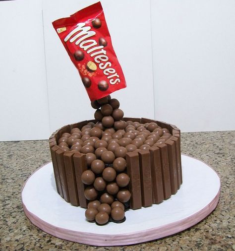 Kitkat & Maltesers chocolate cake covered in chocolate ganache & decorated with kitkat & maltesers Rolo Cake, Chocolate Birthday Cake Decoration, Duper Cake, Maltesers Chocolate, Malteser Cake, Kitkat Cake, Chocolate Cake Decorating, Chocolate Cake Designs, Gravity Cake