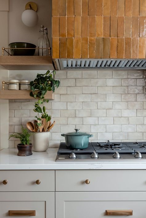 Amber Tiles Kitchen, Cream Subway Tile Backsplash, Cream Subway Tile, Wrapped Kitchen, Wainscoting Wall Paneling, Gold Frame Gallery Wall, California Cottage, Dark Wood Coffee Table, Wainscoting Wall