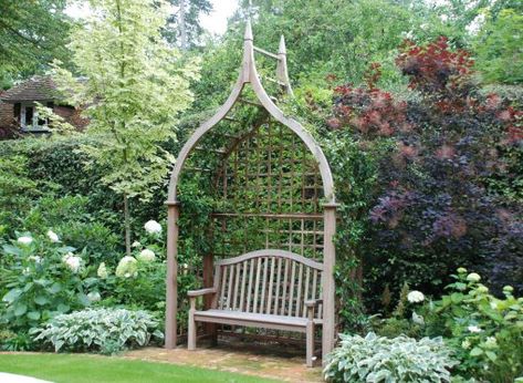 Gothic Arbour by stuartgardens.com Dimensions: 2033 x 813 x 3891mm (high) Product Code: SA-GOTH - Gothic Seat Arbour Manufactured in kiln dried Iroko hardwood with a palne and sanded finish Garden Arbour, Garden Pergolas, Garden Arch Trellis, Pagoda Garden, Outdoor Garden Bench, Arch Trellis, Garden Obelisk, Gothic Garden, Garden Benches