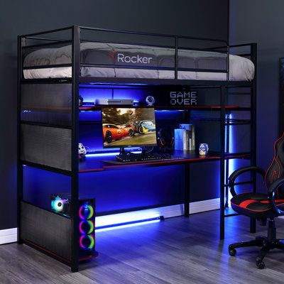 The BattleBunk X Rocker Gaming High Sleeper is a versatile gaming desk/bunkbed hybrid, perfect for younger gamers. Featuring a high sleeper platform and gaming desk with upper shelving for collectibles and storage. Constructed with a strong and durable metal frame provides stability while the gaming desk can house multiple monitor setups for the ultimate gaming experience. | X Rocker Bunk Bed w / Shelves 71.85 H x 41.34 W in black / brown / redWood / Metal in Black;red | Twin | Wayfair Gaming Room Setup Loft Bed, Bunk Bed Gaming Setup, Gaming Room Setup Desks, Gaming Bunk Bed, Gaming Bed, Gaming Bedroom, Gamer Bedroom, High Sleeper Bed, Bunk Bed With Desk