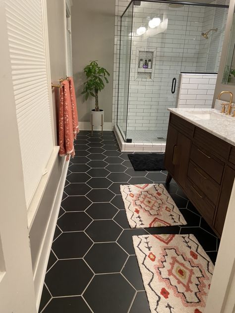 Mid-Century modern Master Bath. Black hexagon tile with gray grout. White subway tile with gray grout. Kohler Vibrant Moderne Brushed Gold fixtures. Black Tile With White Grout, White Tile Black Grout Floor, White Hexagon Tile With Black Grout, Black Octagon Tile Bathroom, White Hexagon Tile Black Grout, White Tile Black Grout, Black Hexagon Bathroom Floor, Black Hexagon Tile White Grout, Black Tile Gray Grout