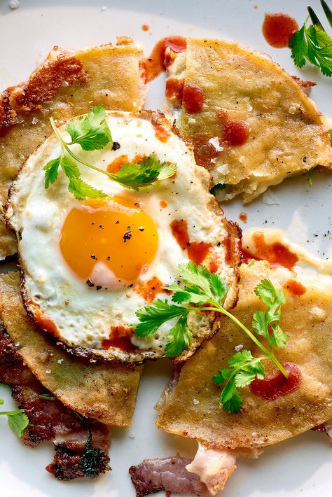 Fried Egg Quesadilla Recipe - NYT Cooking Spanish Fried Egg, Crisp Gnocchi, Sautéed Scallops, Egg Quesadilla, Broiled Pork Chops, Spanish Tortilla, Scallops Recipe, Rotisserie Chicken Salad, Cooking Breakfast