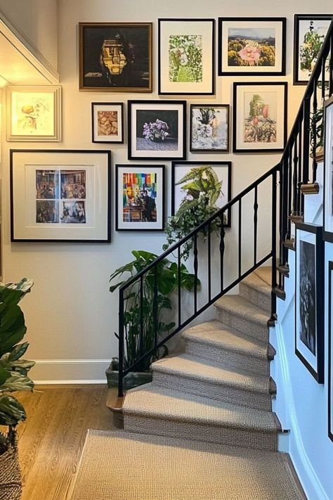 Create a unique gallery wall along your staircase for an eye-catching look. #GalleryWall #StaircaseDecor #WallArtIdeas Wall Staircase, Staircase Gallery, Gallery Wall Staircase, Gallery Wall Ideas, Unique Gallery Wall, Staircase Decor, Gallery Walls, Wall Ideas, Staircases