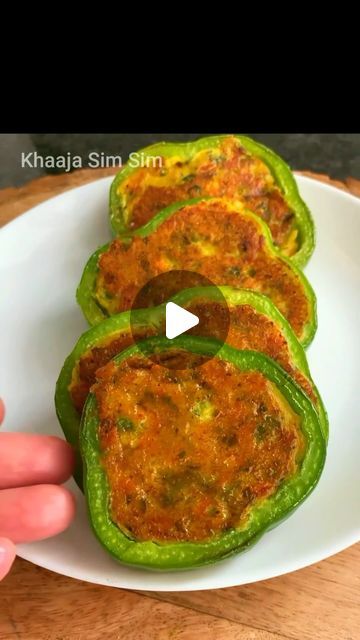 Khaaja Sim Sim on Instagram: "Protein loaded Stuffed Capsicum🫑, Bharwa Shimla Mirch, Healthy Version👍🏻

For detailed recipe checkout my YouTube channel ‘khaaja Sim sim’. Link in the highlights & bio.♥️

🌱Ingredients-
Carrot- 1
Capsicum- 1/2
Green chilli- 1
Paneer- 100 gms
Coriander leaves- 2 tbsp
Besan- 1/3 cup
Pepper- 1/2 tsp
Turmeric powder- 1/2 tsp
Salt- 1/2 tsp
Capsicum- 2

#stuffedcapsicum #stuffedcapsicums #stuffedcapsicumrecipe #stuffedshimlamirch #capsicum #capsicumrecipes #cooking #homecooking #cookingram #lovecooking #ilovecooking #cookingclass #cookingtime #healthycooking #cookingathome #cookingwithlove #easycooking #homemadecooking #instacooking #cookingvideo #simplecooking" Simla Mirch Recipes, Stuffed Capsicum, Capsicum Recipes, Healthy Version, Turmeric Powder, Shimla, Coriander Leaves, Green Chilli, Cooking Videos