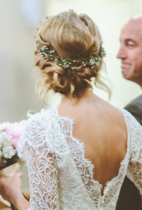 Brides.com: The Best Wedding Hairstyles on Pinterest. A Twisted Low Bun Wedding Hairstyle with Flower Crown. This bride's romantic vintage aesthetic was perfect for her ceremony at a historic church in Atlanta, followed by a reception at a courtyard with a Tuscan feel. From the intricately twisted bun and simple wreath to the lace gown with a deep V-neck, this is all about the back view. Want to test-drive the look? Her style requires many bobby pins, so use U-shaped pins that are the same colo… Flower Crown Hairstyle, Best Wedding Hairstyles, Fishtail Braid, Wedding Hair And Makeup, Wedding Dress Styles, Wedding Pinterest, Wedding Bells, Flower Crown, Bride And Groom