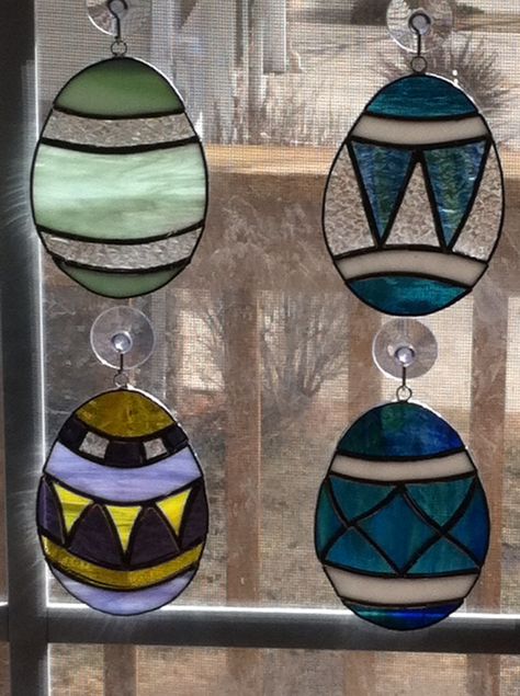 Stained glass, copper foil Easter eggs, $15 each, many colors and designs! Stained Glass Easter Eggs, Easter Stained Glass Ideas, Spring Stained Glass Ideas, Easter Stained Glass Patterns, Simple Suncatchers, Stained Glass Easter, Stained Glass Decor, Stained Glass Ornaments, Stained Glass Jewelry