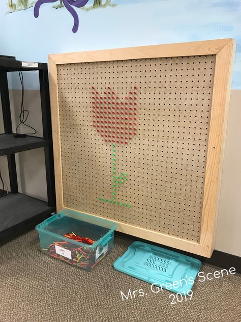 Makerspace pegboard in the library Pegboard Preschool Ideas, Classroom Pegboard Ideas, Makerspace Preschool, Pegboard In Classroom, Teacher Pegboard, Diy Pegboard Marble Run, Pegboard Classroom, Stem Makerspace Playroom, Library Makerspace Ideas