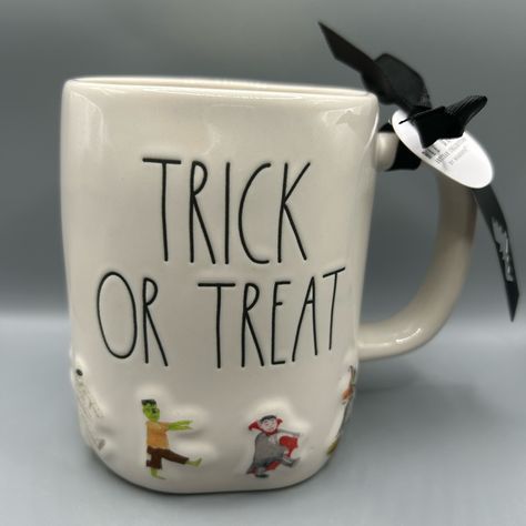 Rae Dunn Trick Or Treat Halloween Mug With Monsters Witch Mummy Vampire New Please Note That This Is A Hand Crafted Item And It Is Not Uncommon For These Pieces To Have Pinholes, Uneven Colors And Imperfections In The Finish. This Does Not Make The Item Damaged Or Defective. It Is What Makes Hand Crafted Items Unique!!! Rae Dunn Is Perfectly Imperfect! Rae Dunn Halloween, Tiered Trays, Halloween Mug, Perfectly Imperfect, Craft Items, Halloween Treats, Rae Dunn, Trick Or Treat, New Color