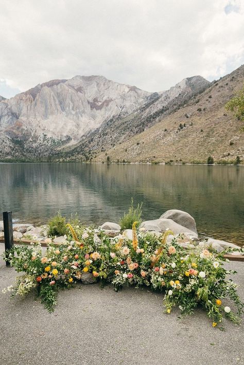 Ceremony ground arch at Convict Lake
#wedding #whimsical #romantic #ceremony
#ruffleeffect #mammoth Convict Lake Wedding, Grounded Wedding Arch, Wedding Ground Arch, Ceremony Ground Florals, Ceremony Ground Arch, Floral Ground Installation, Wedding Ceremony Flowers On Ground, Ground Florals Wedding Ceremony, Ground Arch Wedding