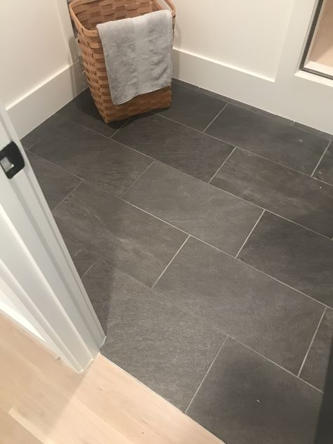 Grey Tile Floors Bathroom, Large Black Tile Floor, Slate Grey Bathroom Tile, Dark Floors Bathroom Ideas, Slate Gray Bathroom Floor, Slate Laundry Room Floor, Dark Tile In Bathroom, Dark Grey Herringbone Tile Bathroom, Simple Tile Floor