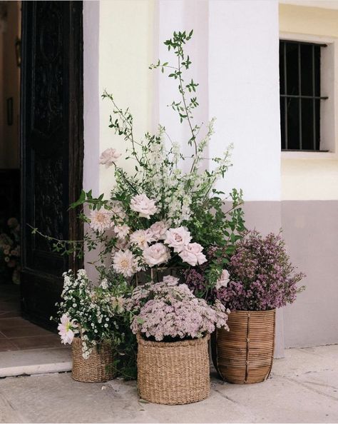 Love using the bushel baskets to gain height while still preserving the quaint aesthetic Floral Baskets Wedding, Lavender Wedding Centerpieces, Lavender Wedding Colors, Rustic Wedding Decor Diy, Christmas Advent Wreath, Lavender Wedding Flowers, Church Wedding Flowers, Bushel Baskets, Wedding Ceremony Arch