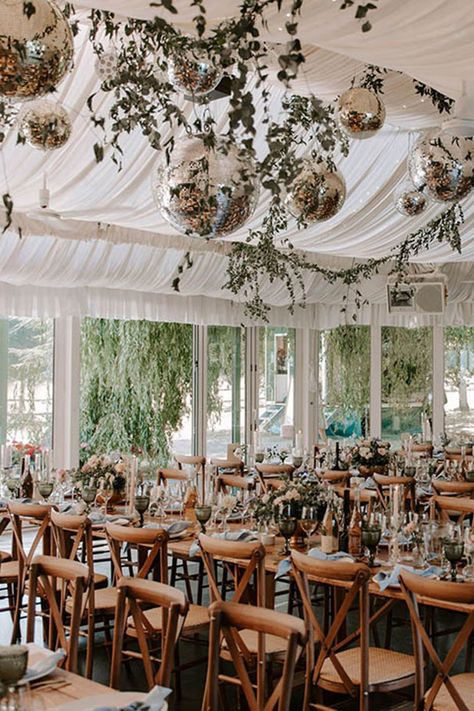 Sparkling disco balls hanging from the marquee at the farm wedding venue with foliage and pink taper candles Marquee Wedding Reception, Pink Taper Candles, Wedding Reception Lighting, Wedding First Dance, Candle Wedding Decor, Farm Wedding Venue, Country Houses, Rock My Wedding, Marquee Wedding