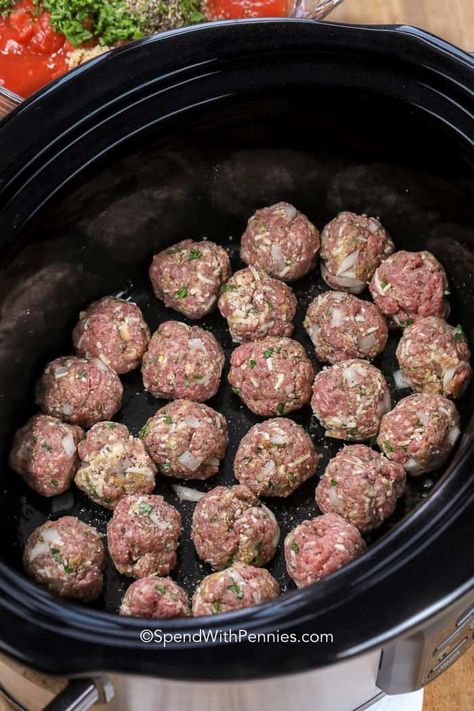 Once sauced up, these homemade crockpot meatballs cook slowly and evenly, keeping all the juices and flavors tucked neatly inside every savoury little meatball. #spendwithpennies #crockpot #meatballs #crockpotmeatballs #easyrecipe #meatballrecipe #italianmeatball #makeahead #meatballswithsauce Easy Meatballs In Crockpot, Crock Pot Meatballs Homemade, Crockpot Meatballs And Sauce, Meatballs In Crockpot Homemade, Crockpot Meatballs For Spaghetti, Homemade Slow Cooker Meatballs, Homemade Meatballs Recipe Crockpot, Homemade Meatballs In Crockpot, Healthy Meatballs Crockpot