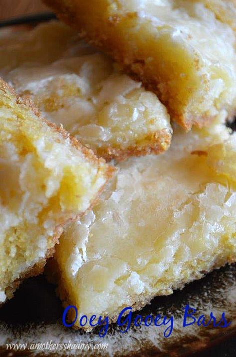 Ooey Gooey Bars Delta Bars Recipe, Yellow Cake Bars, Ooey Gooey Lemon Bars, Oort Gooey Bars, Lemon Gooey Bars, Obey Gooey Bars, Poet Gooey Bars, Man Bars Recipe, Ooy Gooy Bars