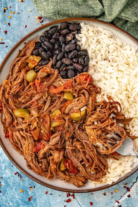 Ropa Vieja Recipe (Cuban Shredded Beef) Recipe - Chili Pepper Madness Ropa Vieja Recipe Slow Cooker, Cuban Recipes Authentic, Cuban Ropa Vieja Recipe, Cuban Beef, Shredded Beef Recipe, Ropa Vieja Recipe, Shredded Beef Recipes, Steak And Chips, Chili Pepper Recipes