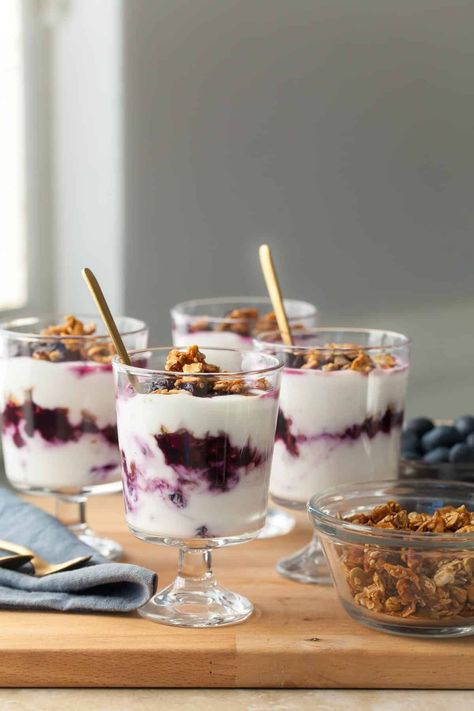 Enjoy these easy blueberry parfaits made with roasted blueberries, creamy yogurt, and crunchy granola for breakfast, a snack, or dessert. Use dairy-free yogurt for a vegan option! Roasted Blueberries, Strawberry Cucumber Salad, Gluten Free Overnight Oats, Strawberry Cucumber, Blueberry Yogurt, Creamy Yogurt, Gluten Free Waffles, Parfait Breakfast, Gluten Free Granola