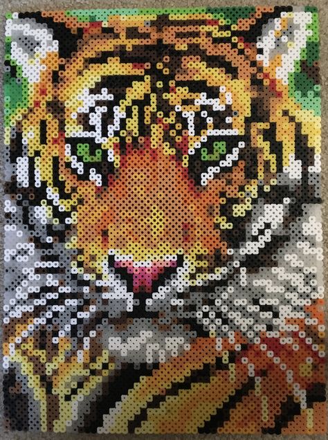 Perler Bead Tiger Tiger Perler Bead Patterns, Perler Bead Tiger, Tiger Pixel Art, Perler Bead Crafts, Art Tigre, Pixel Quilting, Pokemon Bead, Pearl Beads Pattern, Easy Perler Beads Ideas