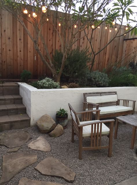 Small Backyard With Retaining Wall, Cinderblock Patio Ideas, Landscape Ideas Retaining Wall, Cinderblock Retaining Wall Ideas, Small Retaining Wall Ideas Front Yard, Retaining Wall Small Backyard, Retaining Wall Makeover, Painting Retaining Wall Blocks, Cinderblock Retaining Wall Diy