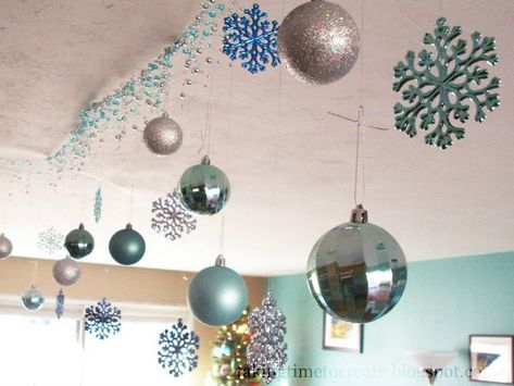 15 Christmas Ceiling Decorations To Make Christmas Special - Christmas has always been a much awaited affair and many have planned from the months up to Christmas about what they should do and how they should decorate their homes and offices. Christmas celebrations include … Christmas Ceiling Decorations Ideas, Christmas Ceiling, Christmas Ceiling Decorations, Winter Interior Design, Colorful Chandelier, Ceiling Decorations, Christmas Lights Garland, White Fairy Lights, Christmas Creative