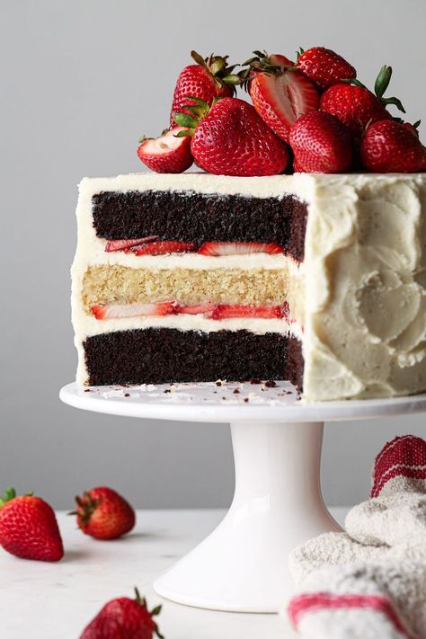 This Neapolitan layer cake combines the delicious flavors of vanilla, chocolate, and strawberry! Vegan friendly with a gluten free option! Chocolate Vanilla Strawberry Cake, Chocolate And Vanilla Layer Cake, Chocolate Cake With Fresh Strawberries, Chocolate Strawberry Wedding Cake, Chocolate And Vanilla Cake Layer, 2 Layered Cake, Neapolitan Desserts, Vanilla Strawberry Cake, Chocolate Cake With Strawberries