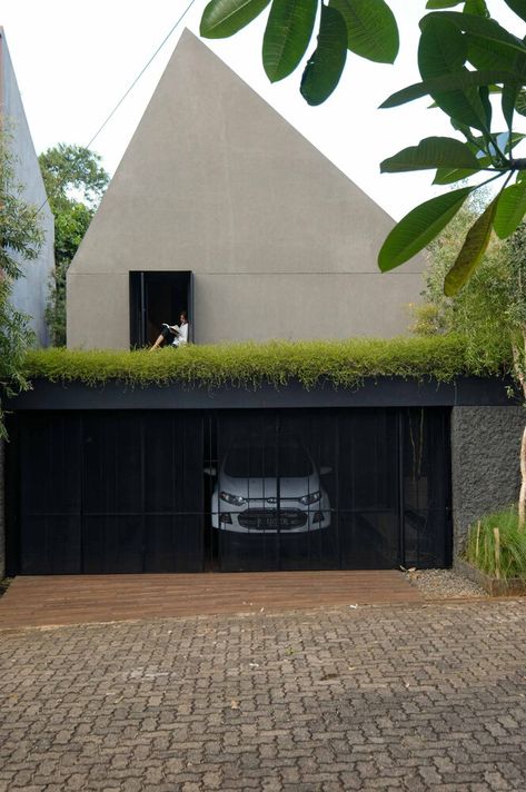 Gallery of Cinere House / After Office - 6 Concrete Door, Indonesian House, Modern Tropical House, Villa Project, Industrial Home Design, House Design Exterior, Garage Cafe, Narrow House, Architecture Model House