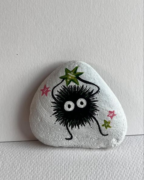 Painting Studio Ghibli characters 🥹🤗. 🤩 I am obsessed. Is this a good or a bad obsession? #studioghibli #art #artist #painting #viralart Rock Painting Ideas Studio Ghibli, Art Rocks Painting, Studio Ghibli Rock Painting, Studio Ghibli Gifts Diy, Paint Rock Ideas, Drawing On Rocks Ideas, Painting Ideas Studio Ghibli, Pin Painting Ideas, Painting On Rocks Ideas