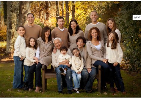 A suggested 'do' on how to dress for an extended or any size family group photo. This mix of neutrals: tans, off whites and light wash jeans keeps the focus on the family. Family Of 13 Picture Poses, Extended Family Pictures Neutrals, Group Photos Family, Family Of 11 Photo Shoot, Family Photos In Vineyard, 12 Person Family Photos, Family Photos With Bench, Apple Orchard Family Pictures Outfits, Multiple Generation Family Pictures