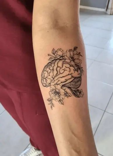 20 Best Brain Tattoo Design Ideas & Meaning in 2023 - Tattoo Twist Flower Brain Tattoos, Brain Tattoo Design, Spoonie Tattoo, Rare Tattoos, Biblical Tattoos, Survivor Tattoo, Brain Tattoo, Latest Tattoo Design, Bookish Tattoos