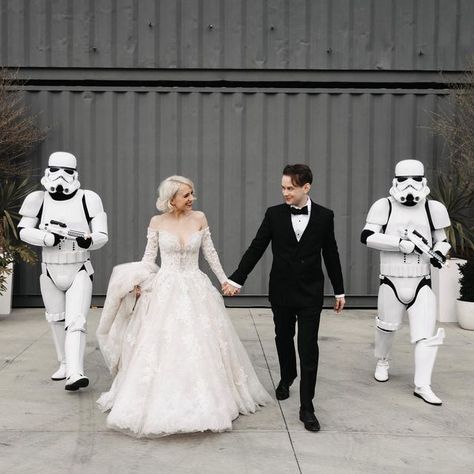 Tessa Netting on Instagram: "HAPPY STAR WARS DAY!! From the nerdiest bride & groom in the galaxy 💫 May the 4th be with you 🖤 ✨ Photo: @pagesstudio ✨ Stormtroopers: @characters.io Coordinator: @somethingborrowedweddings Reception Venue: @lariverstudios Hair & Makeup: @bysoreya Dress: @maggiesotterodesigns @mariposabride @jadungca #weddingshowses #starwars #starwarsday #starwarswedding #maythe4thbewithyou #maythe4th #maythefourthbewithyou #geekwedding" Star Wars Wedding Dress, Ugly Wedding, Happy Star Wars Day, Geek Wedding, Star Wars Wedding, May The 4th, May The 4th Be With You, Star Wars Day, Cute Stars