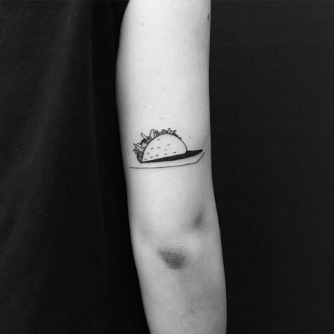 Black and white taco tattoo by Chinatown Stropky inked above the right elbow Taco Tattoo, Taco Tattoos, Tattoo Black And White, Worlds Best Tattoos, Black White Tattoos, Alien Tattoo, Tattoo Photography, Tattoo Magazines, Tattoo Black