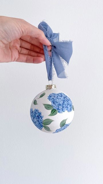 Elizabeth | Painter & Educator on Instagram: "This is what I get for painting my sample in July…I forget what blues I used 🤣🙈 Now I’m on a mission to recreate the perfect blue hydrangea! #ornament #ornaments #christmasornament #christmasornaments #christmasdecor #itsbeginningtolookalotlikechristmas #handpainted #handmade #handpaintedornaments #artornaments #bluehydrangea #bluehydrangeas #hydrangeaornament #grandmillennial #grandmillennialdecor #grandmillenialstyle #grandmillennialchristmas #bl How To Paint A Hydrangea, Handpainted Christmas Ornament, Hand Painted Ornaments Diy, Painting Ornaments Diy, Ornament Painting Ideas, Blue White Aesthetic, Grandmillennial Christmas, 2024 Ornaments, Celebration Plate