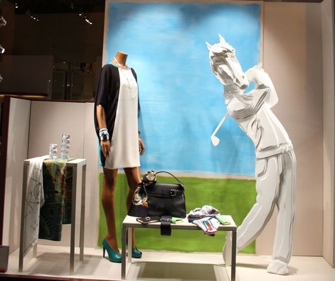 Hermés in Bologna,Italy,"GOLF:is a precision club and ball sport in which competing players hit balls in a series of holes on a course using the fewest number of strokes", pinned by Ton van der Veer Shop Merchandising, Hermes Window, Mannequin For Sale, Ton Van Der Veer, Retail Windows, Bologna Italy, Golf Shop, Window Dressing, Window Dressings