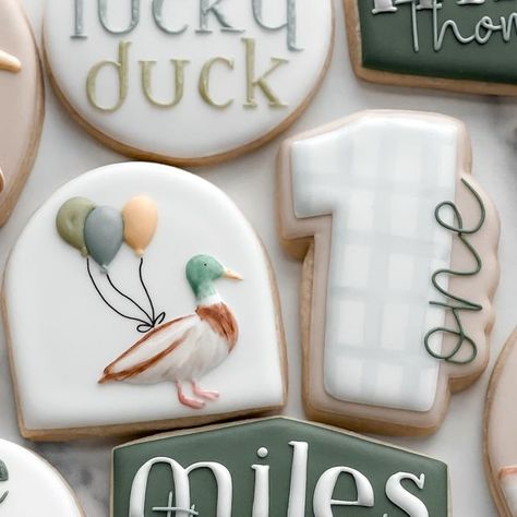 Jess Linstra on Instagram: "Miles is one lucky duck 🦆  #cookies #njcookies #cookiesofinstagram #decoratedsugarcookies #firstbirthdaycookies #oneluckyduck" One Lucky Duck Birthday Party Cookies, Duck Duck Deuce Birthday, 1 Lucky Duck Birthday, Mallard Duck Cookies, One Silly Goose Cookies, One Lucky Duck Cookies, One Lucky Duck Cake, One Lucky Duck Birthday Cake, Mallard Duck Birthday Party