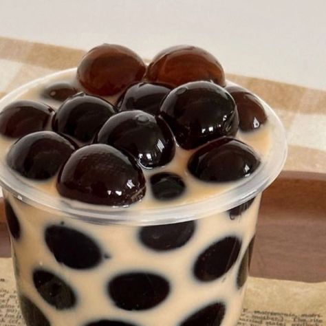 michael | edible nostalgia on Instagram: "let’s make those viral big boba drinks 🧋 well it’s actually jelly and you can use a round ice tray to make them! grass jelly recipe 90g grass jelly powder (linked under drink ingredients) 3 1/2 tbsp sugar (adjust to desire) 4 cups of water 2 round silicone ice trays Instructions 1. Bring 3 cups of water to a boil in a pot 2. Mix 1 cup water, grass jelly powder, and sugar in a small bowl 3. Once water boils, slowly pour in the mixture and keep mixing s Boba Jelly, Jelly Boba, Drink Ingredients, Grass Jelly, Jelly Recipe, Silicone Ice Trays, Boba Drink, Round Ice, Cats Pictures