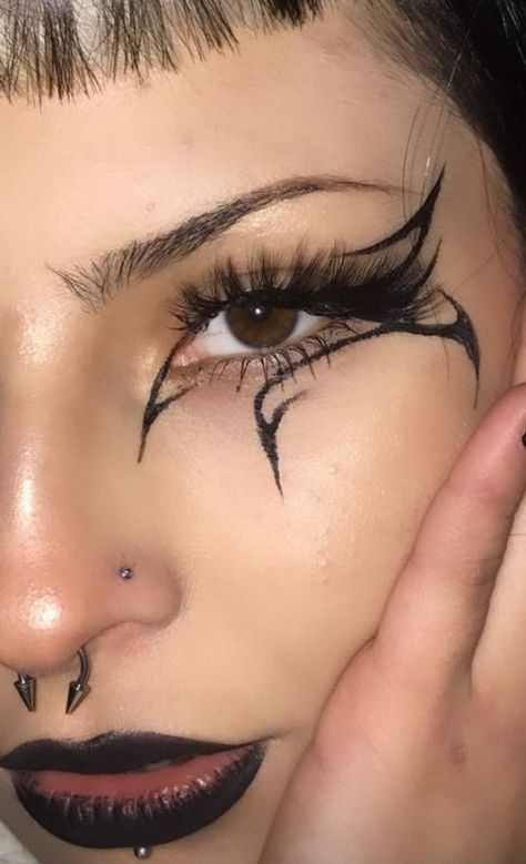 Graphic Eyeliner With Gems, Cross Eyeliner, Goth Liner, Weird Eyeliner, Graphic Eyeliner Goth, Cool Eyeliner Designs, Gothic Eyeliner Ideas, Pixie Makeup, Eyeliner Designs