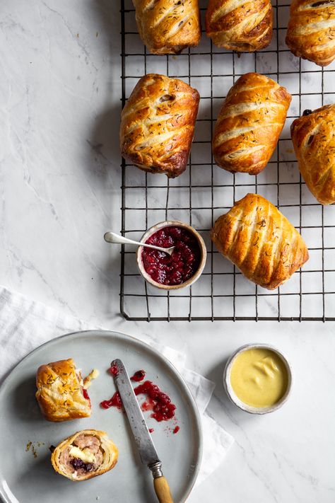 These Cranberry and Brie Sausage Rolls are the perfect treat, whether as party nibbles or tucked away in a picnic hamper. The brie and cranberries make for a perfect pairing to really enhance the ever-popular sausage roll. Sausage Roll Photography, Cranberry And Brie, Savoury Pastry, Roll Photography, Party Nibbles, Brie Cranberry, Cranberry Brie, Nibbles For Party, Sausage Bread