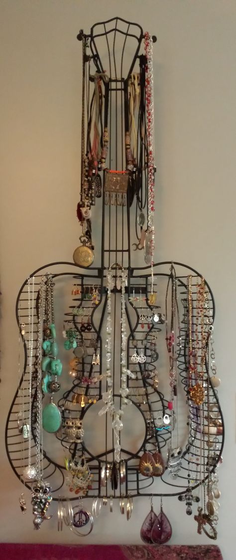 I love my guitar CD rack and I really wanted to use it, but I no longer have CDs, so I converted it to a jewelry hanger. Perfect! Guitar Cd Rack, Cd Rack, Cd Holder, Jewelry Holders, Jewelry Hanger, Junk Drawer, Crafty Projects, Dream Room, Room Inspo