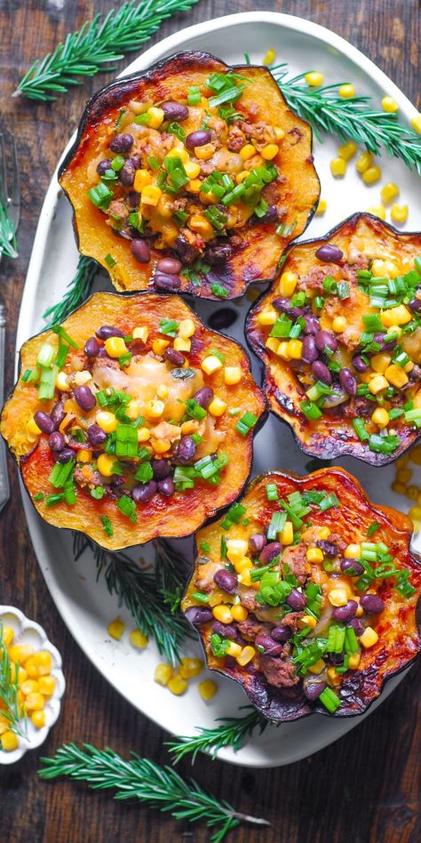 Ground Beef Stuffed Acorn Squash (Southwestern-style) on a white platter. Beef Stuffed Acorn Squash, Acorn Recipe, New Recipes For Dinner, Stuffed Acorn Squash, Acorn Squash Recipes, Green Chiles, Acorn Squash, Winter Squash, Squash Recipes