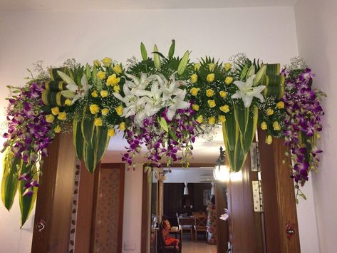 Door decorations can make celebrating a special occasion on your cruise even more fun, whether it is a birthday, anniversary, retirement, family reunion or any other event. It also sets the tone for interior décor. If you are thinking of door decoration with flowers, we can help you fulfill your dream. We are a supplier of wholesale flowers for a door decoration. Reach to us: https://bit.ly/2OPmtxt Flower Decoration For Door Entrance, Front Door Flower Decoration Indian, Vastu Shanti Pooja Decoration, Entrance Door Flower Decoration Indian, Door Flower Decoration Indian, Main Door Flower Decoration Indian, Door Decoration With Flowers, Gate Decoration With Flowers, Flower Mala